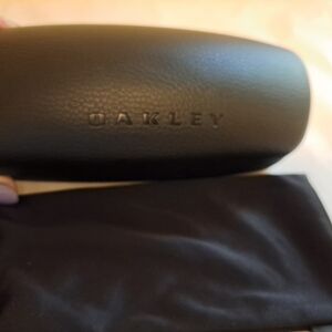 Oakley  black hardshell glass case and bag excellent condition